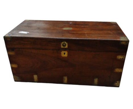 A Victorian camphorwood trunk - the lid with a countersunk ring handle and vacant name plaque enclosing a void interior, the 