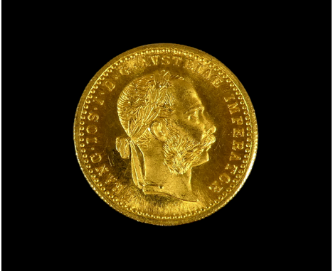 An Austrian Franz Joseph one Ducat gold coin dated 1915, laureate portrait reverse, arms within double headed eagle holding a