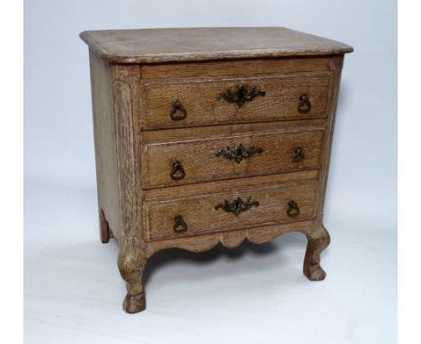 A late 19th century limed oak table top commode - with an arrangement of three drawers on short cabriole legs, width 35cm, de