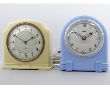 An Art Deco style electric mantel clock by Ferranti - with a blue plastic case, height 15cm, together with another similar Sm
