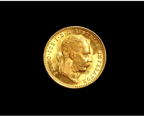 An Austrian Franz Joseph one Ducat gold coin dated 1915, laureate portrait reverse, arms within double headed eagle holding a