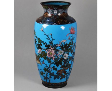 A Meji period Japanese cloisonne vase - of baluster form and decorated with flowers, birds and insects on a light blue ground