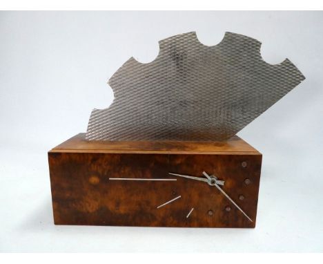 A contemporary walnut and aluminium wall clock - fitted with an electric movement, wide 35cm