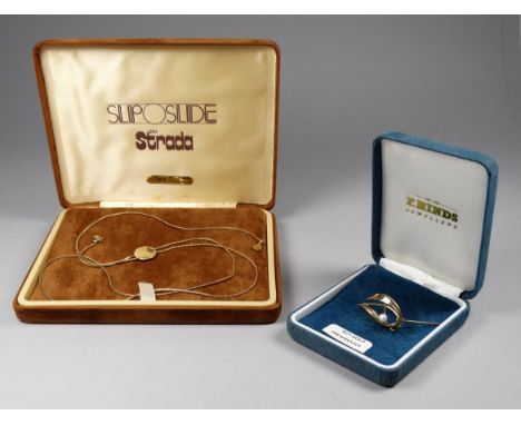 A 9ct yellow gold necklace - set with disk incorporating the initial M, 5.3g together with a 9ct yellow gold brooch set with 