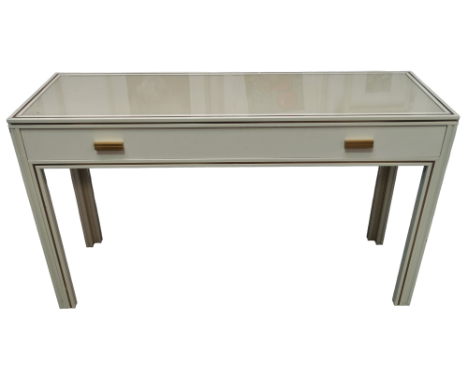 A Pierre Vandel, Paris cream console table - the rectangular top with gilt lining above a frieze drawer on square legs, width