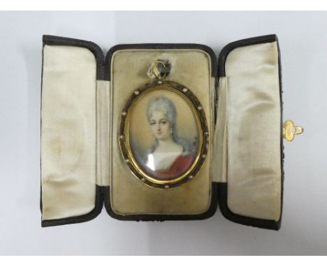 Double locket pendant containing a portrait miniature, signed Hall,  of an 18th century female with grey wig, blue eyes and r