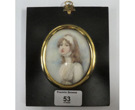 19th century portrait miniature on ivory of Young Woman contained within a glazed and ebonised frame with an acorn suspension