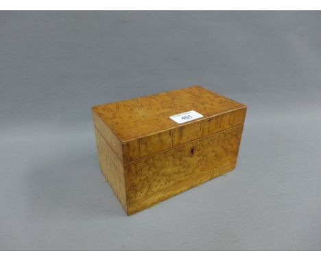 19th century birds eye maple tea caddy box, the hinged lid opening to reveal two lead lined divisions, 18.5 x 11cm 
