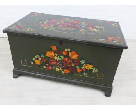 Green painted wooden trunk with handpainted floral sprays, with lift up hinged top and iron handles to side, 50 x 96cm  