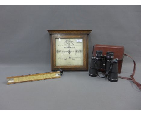 A mixed lot to include a Hamilton &amp; Inches oak cased wall barometer, vintage slide rule and pair of Tasco binoculars (3) 