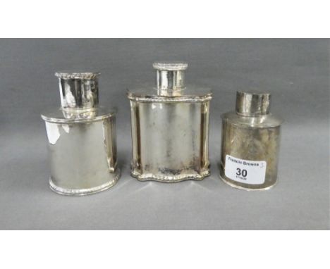 An Edwardian silver tea caddy, Birmingham 1908, together with two silver plated caddies, tallest 11cm (3)  