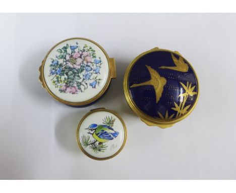 Japanesque Swans, a Royal Worcester porcelain and gilt metal mounted box together with two Royal Worcester enamel boxes (3) 