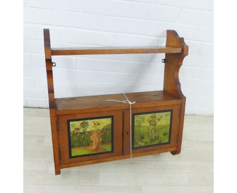 Early 20th century pine wall hanging shelf with a  pair of Nursery Rhyme doors, 64 x 59cm 