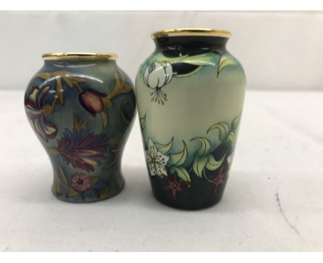 Two boxed Moorcroft enamel vases