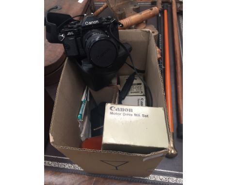 A Canon A2 camera and lenses, power winders etc
