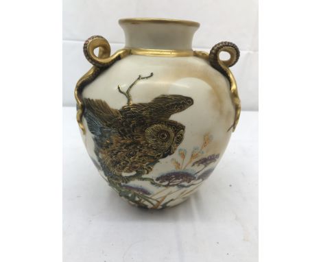 A 19th century Royal Worcester vase attributed to Charles Baldwyn depicting an owl and birds in flight with three serpent-sty