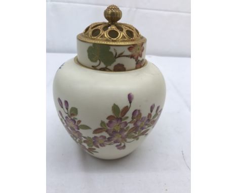 A 19th century Royal Worcester lidded ginger jar decorated in English flower designs on ivory ground: H18cm CONDITION REPORT: