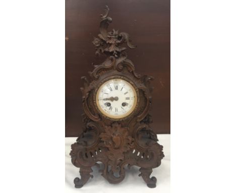 A 19th century floral ornate mantel clock with Marti eight-day movement