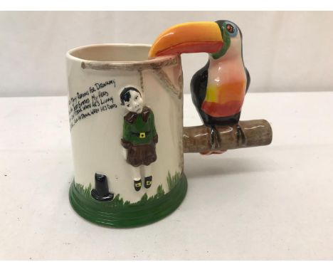 A Carltonware hangman jug with Toucan handle