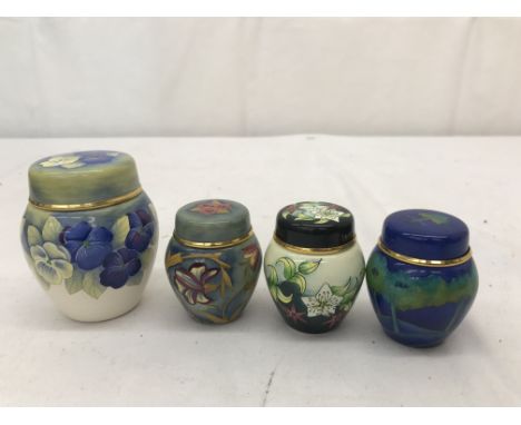 Four boxed Moorcroft enamel ginger jars