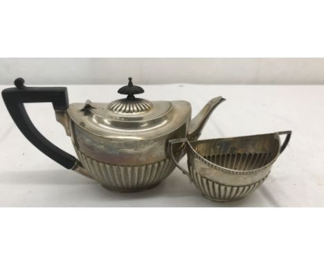 A HM silver teapot and sucrier