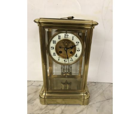 A large brass clock, Marti movement, with mercury thermometer