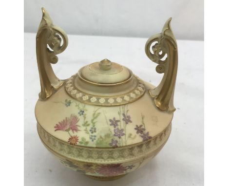 A 19th century Royal Worcester blush ivory twin-handled jar: H13cm