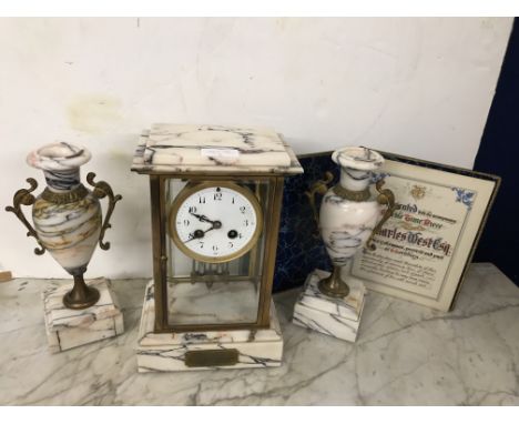 A marble clock garniture with Japy Freres movement striking on gong with a mercury thermometer