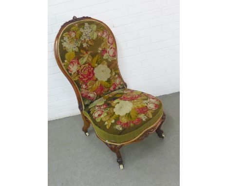 19th century mahogany framed nursing chair with tapestry upholstered back and seat, on ceramic castors, 52 x 102cm 