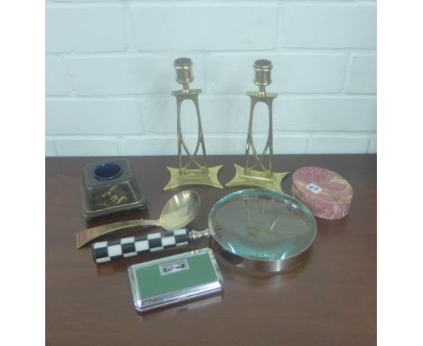 A mixed lot to include a pair of brass Art Nouveau style candlesticks, table magnifying glass, an inkwell and opera glasses e