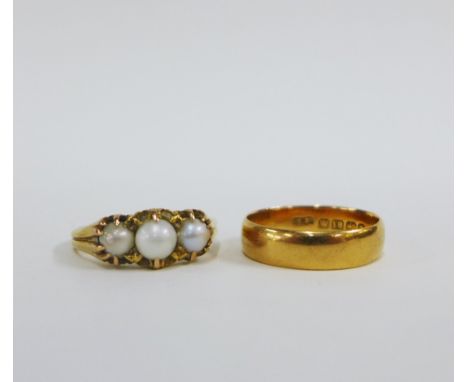 Scottish river pearl ring, set in unmarked yellow metal together with an 18ct gold wedding band, UK ring size  V, (2) 