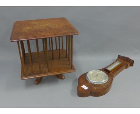 Mahogany wall barometer and a small revolving bookcase, 36cm high (2)&nbsp;