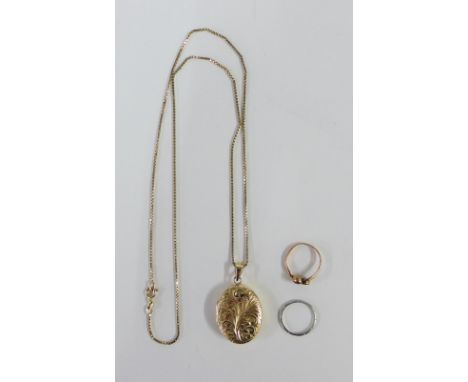 9ct gold oval locket on a 9ct gold chain, white metal wedding band and a scrap metal 9ct gold ring (3) 