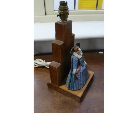 Queen Elizabeth I, a&nbsp;vintage decorative painted metal and oak mounted figural 'Gloriana' table lamp, overall 11in (28cm)