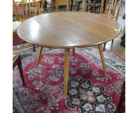 A mid 20thC elm Ercol Drop-flap Table,&nbsp;48in (122cm) x 46in (117cm) x 28in (71cm) high (extended) 
