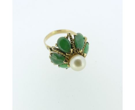 A jade and cultured pearl Dress Ring,&nbsp;mounted in unmarked yellow metal, tested as 9ct gold, Size M. 