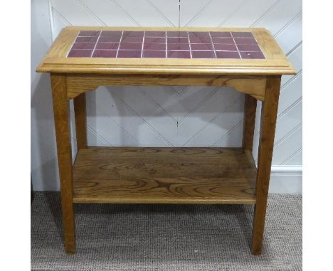 An early 20thC oak Tile-topped Side Table, with undertier, 30½in (78cm) wide x 18¼in (47cm) deep x 28½in (72cm) 