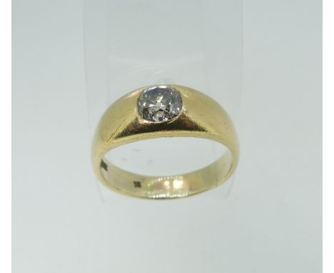 An 18ct yellow gold Gentleman's diamond Ring, the flared front set with a cushion shaped diamond, c. 0.8ct, Size N, approx to