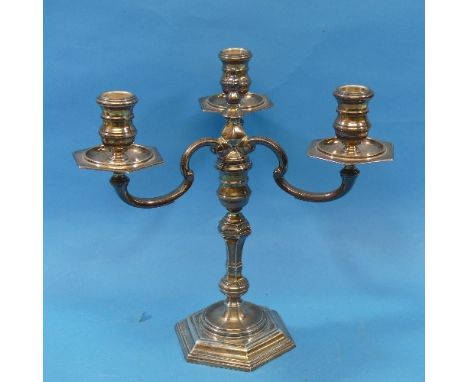 An Elizabeth II silver three branch Candelabrum,&nbsp;by&nbsp;Mappin &amp; Webb Ltd., hallmarked London, 1966, with hexagonal