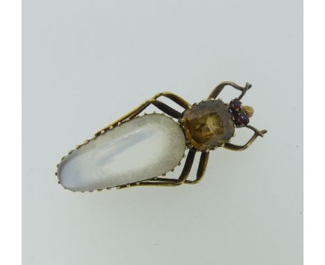 A charming antique 'Bug' Brooch, with moonstone abdomen, citrine thorax and the head set with ruby eyes, all mounted in unmar