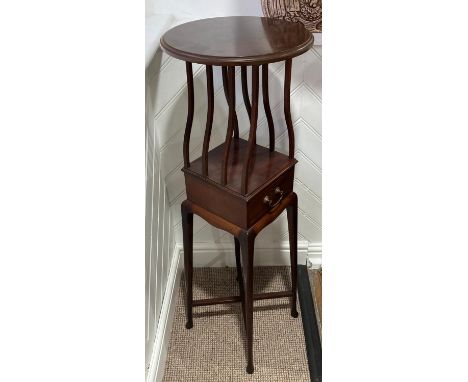 An Edwardian walnut Plant Stand, of architectural form, with single drawer, 14in (36cm) diameter, 42½in (108cm) high. 