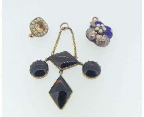 A small 19thC Brooch, the centre set with a facetted citrine within a border of seed pearls, all in unmounted yellow metal, 1