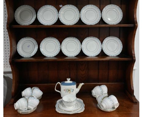 A Grafton China 'Savoy' pattern part Tea Service,&nbsp;comprising eleven Tea Cups and Saucers, ten Plates, one Cake Plate and