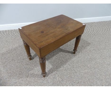 A Victorian mahogany Baby Bath, the lid enclosing a ceramic bath, cracked, raised on turned legs, 23in (57cm) wide x 14in (32