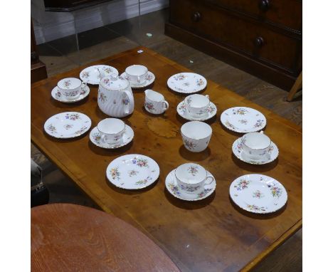 A Minton 'Marlow' pattern Tea Service, comprising six Teacups, five Saucers, six Plates, Teapot, Cream Jug and Sugar Bowl (a 