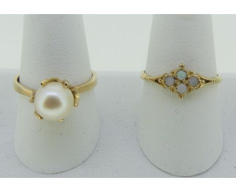 A 9ct yellow gold Ring, set four small opals, Size O½, together with a 9ct yellow gold ring claw set with a single cultured p