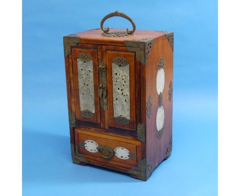 A vintage Chinese walnut Jewellery Casket, the front embellished with brass, with two doors, each with pierced jade panels, e