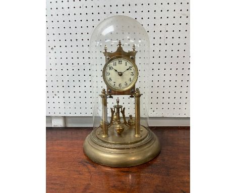 A brass Anniversary Clock,&nbsp;with painted enamel dial, and glass dome, 8in (20cm) diameter x 12½in (31cm) high, together w