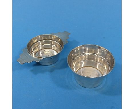 A George VI silver Tea Strainer, by Viner's, hallmarked Sheffield, 1939, in the Art Deco style with stepped handles, circular