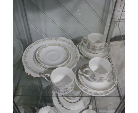 A Paragon China 'Fiona' pattern Tea Service,&nbsp;six place setting, comprising six Teacups and Saucers, six Plates, Cream Ju